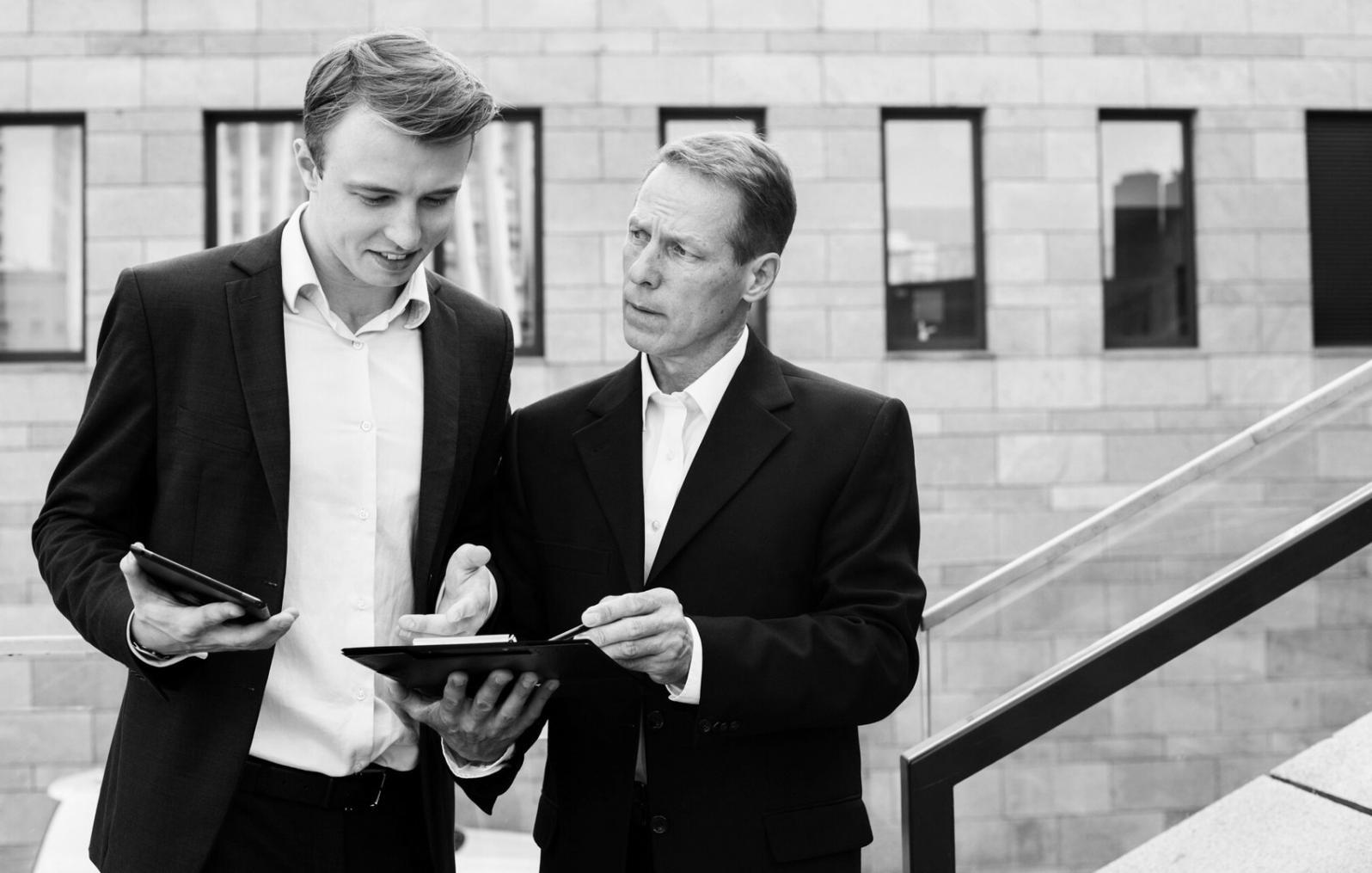 Financial planning consultation showing budget analysis and risk assessment documentation